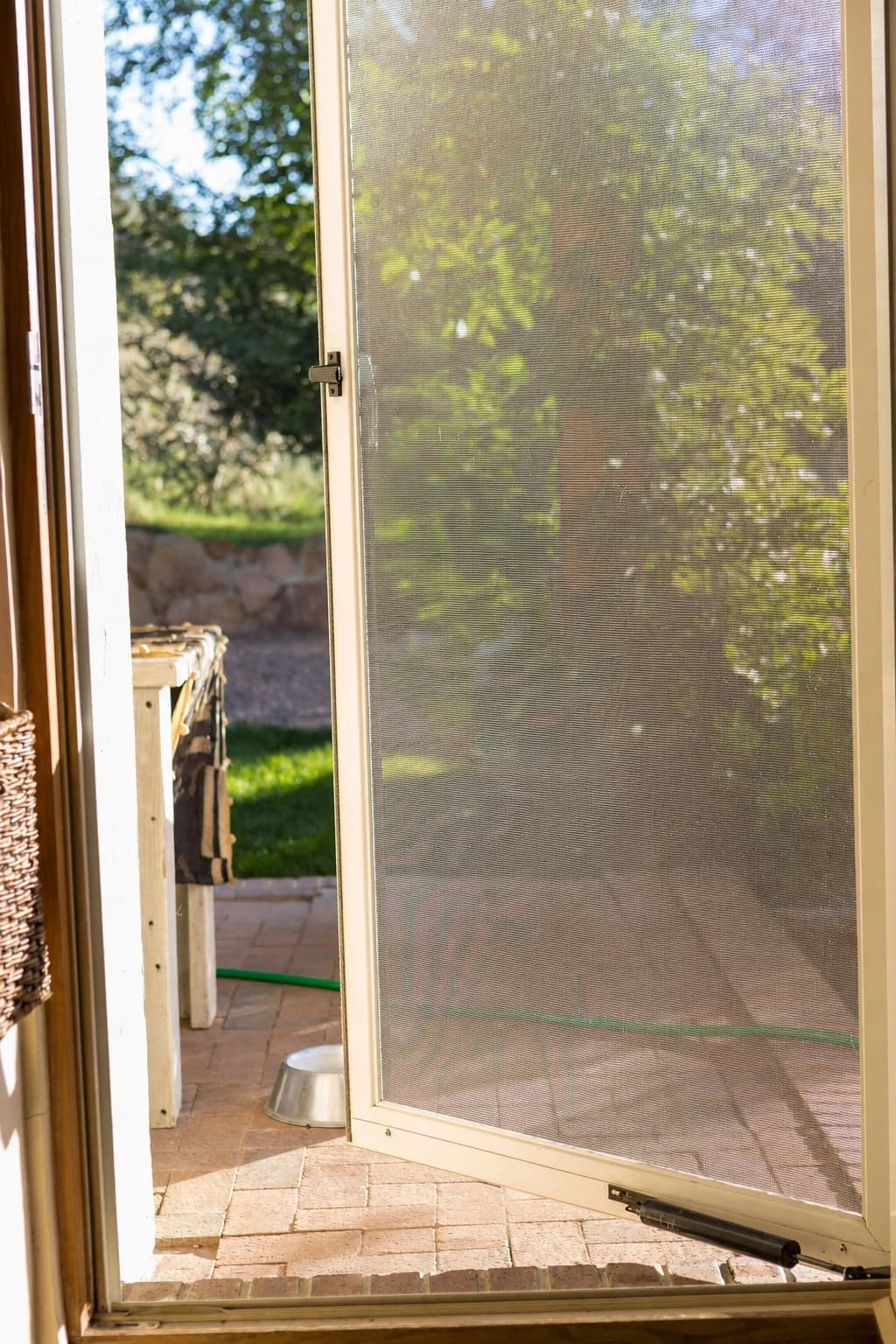 Fly screen door fitted to a residential doorway